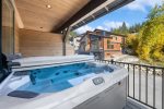 Take a soak in the hot tub and take in the mountain views